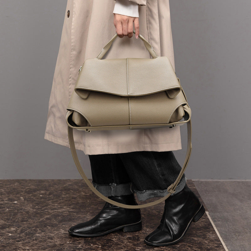 Langry beige leather fashion handbag with flap and chain strap