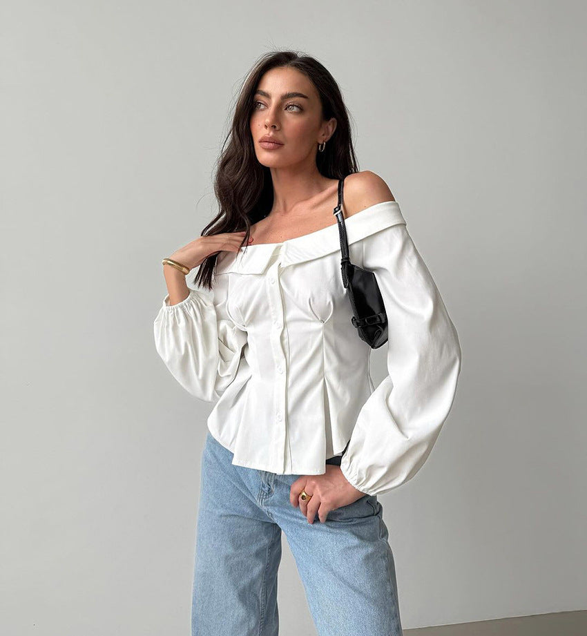 Elegant French off-shoulder shirt styled with billowy sleeves and light blue jeans for fashion