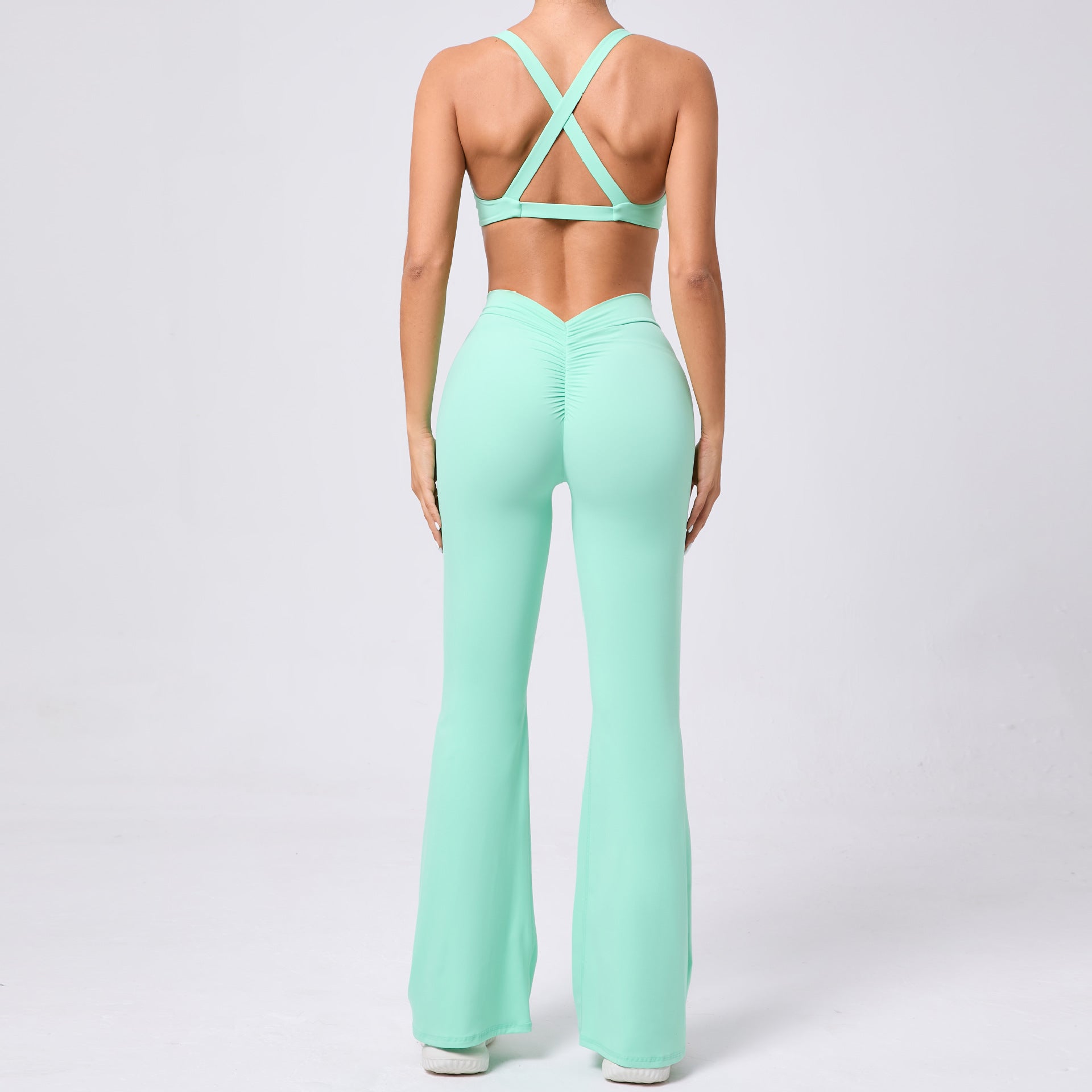 Peach hip raise tight brushed yoga clothes with mint green flared pants