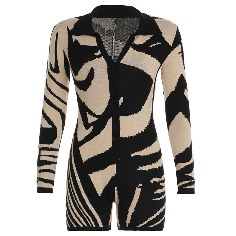 Black and beige patterned knit romper, a stylish long sleeve fashion choice for casual wear
