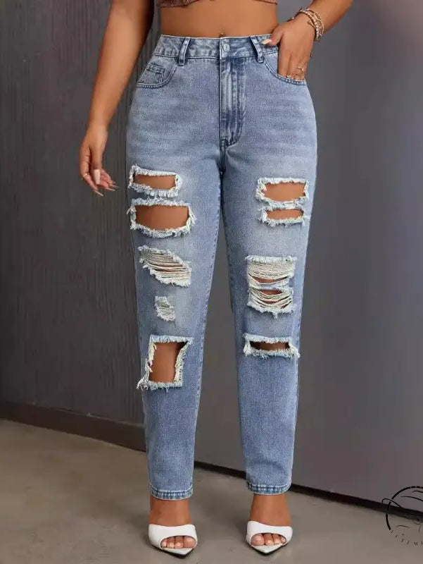 Light blue slimming skinny ripped jeans with distressed tears