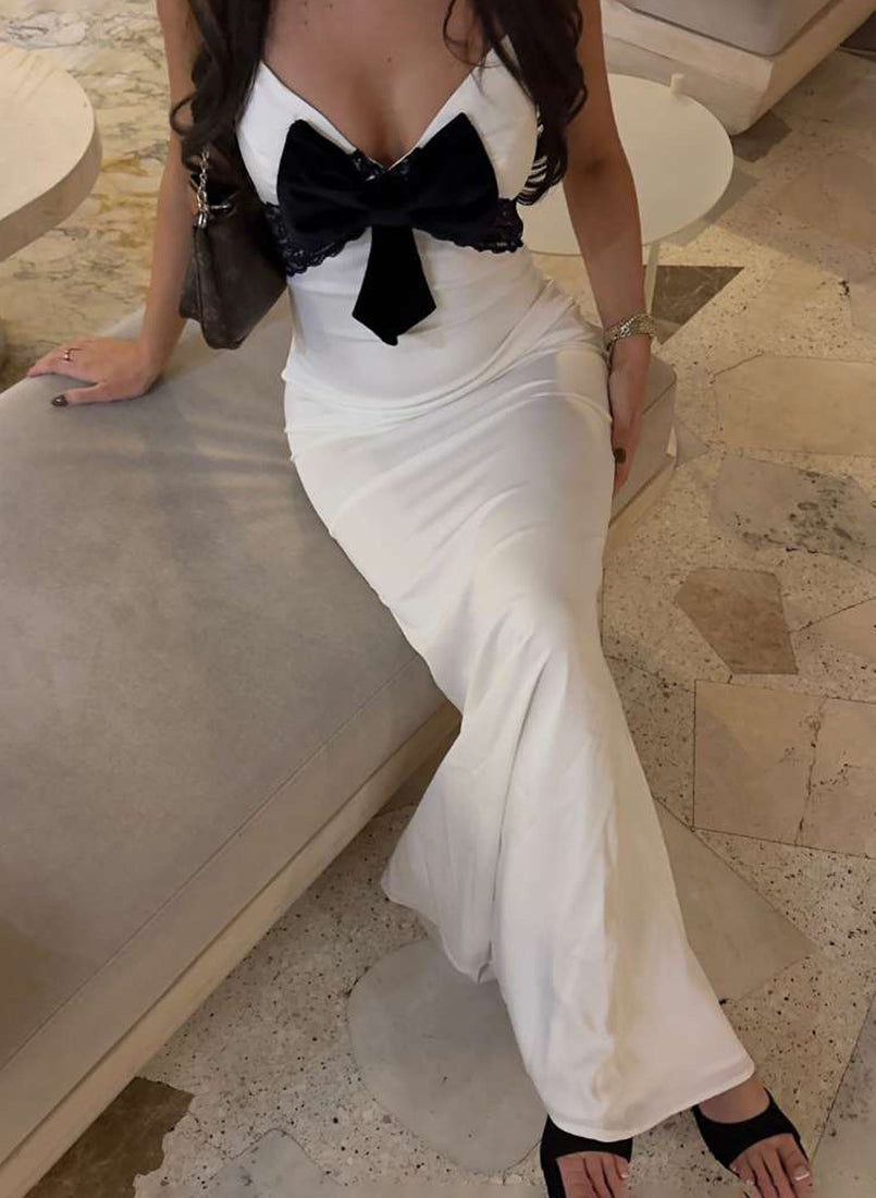 Elegant langry slim fit backless strap dress in white lace with black velvet bow and high slit