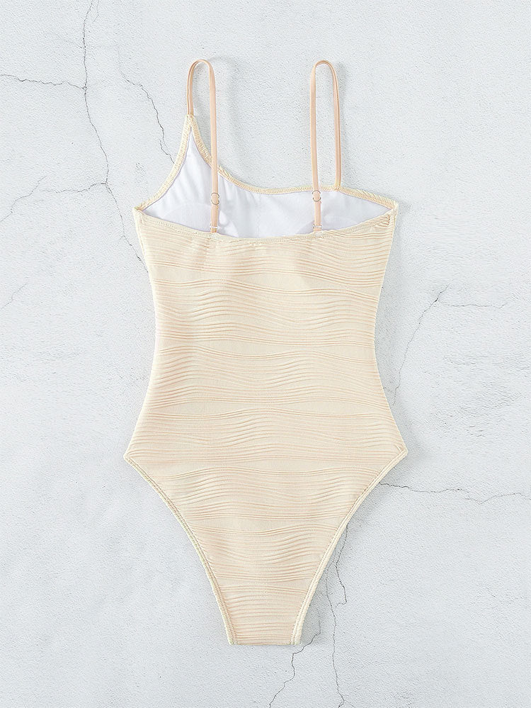 Beige one-piece swimsuit in solid color with push-up design for women