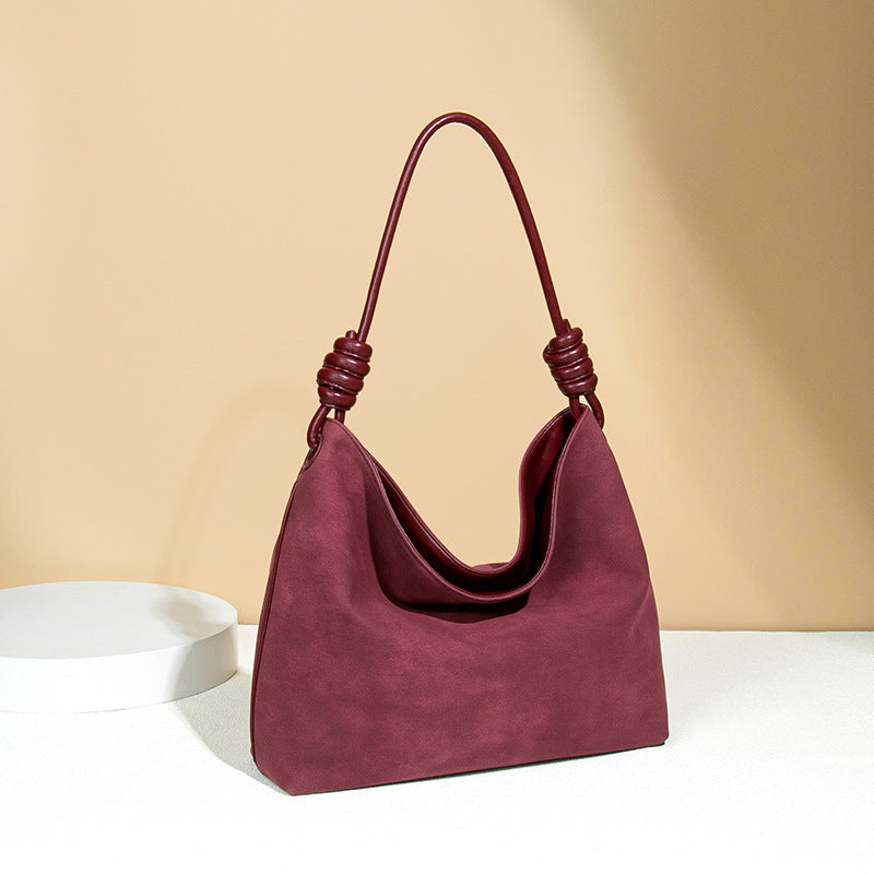 Luxury Frosted Office Bucket Bag in Burgundy suede with knotted handle detail for elegant fashion