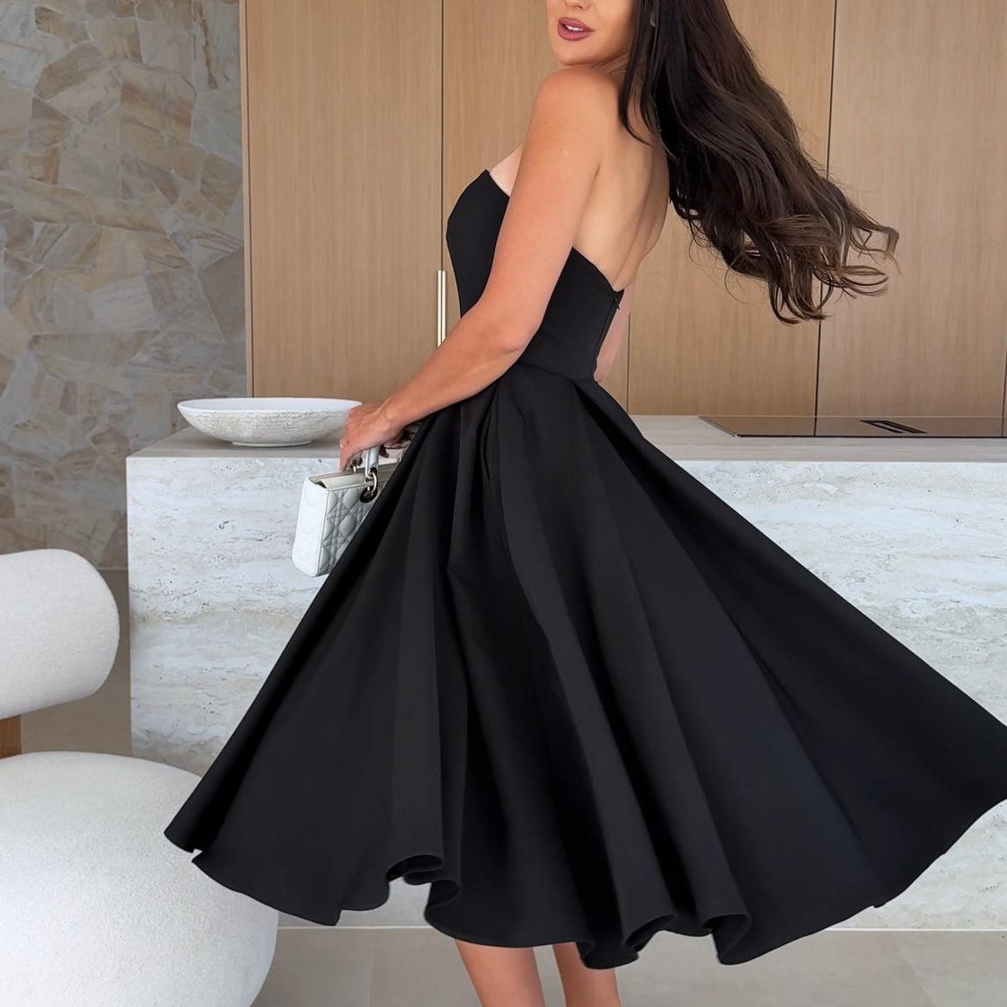 Elegant black strapless dress from Gorgeous Midi Dress, perfect for fashion enthusiasts