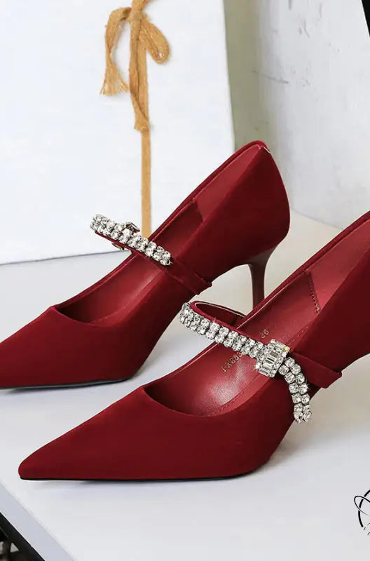 Red satin pointed-toe high heels with rhinestone straps by Langry fashion