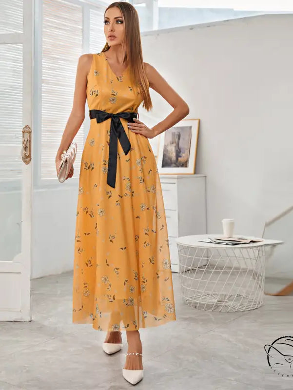 Elegant langry fashion maxi dress in yellow floral with black sash