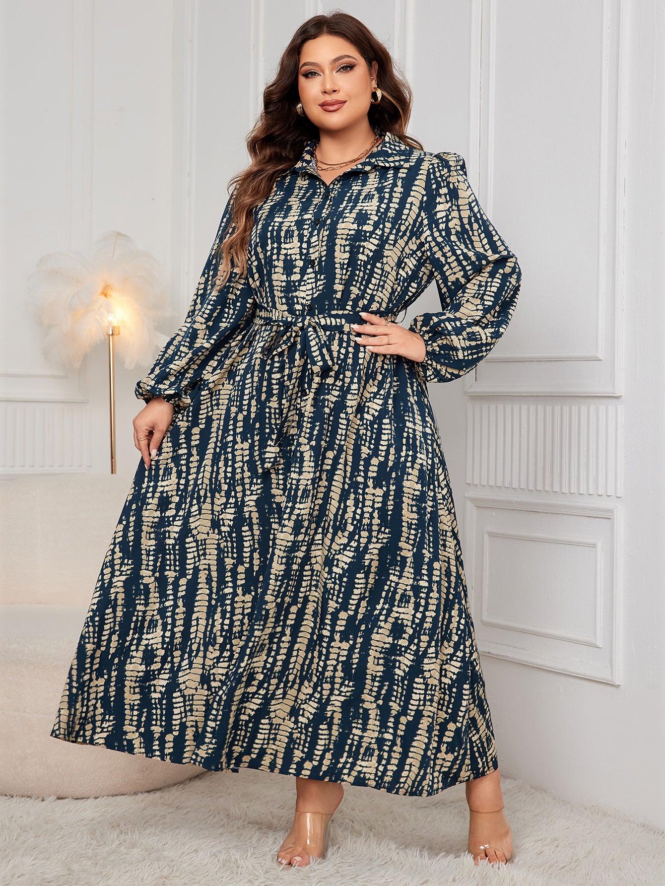 Plus-size tie-dye long sleeve maxi dress in stylish fashion for confident women