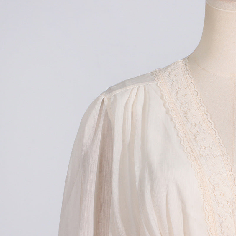 Cream-colored blouse with lace trim from Langry fashion collection for ملابس women