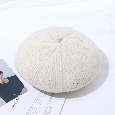 Cream-colored knitted beret from Winter Knitting Hat, a stylish fashion accessory in ملابس