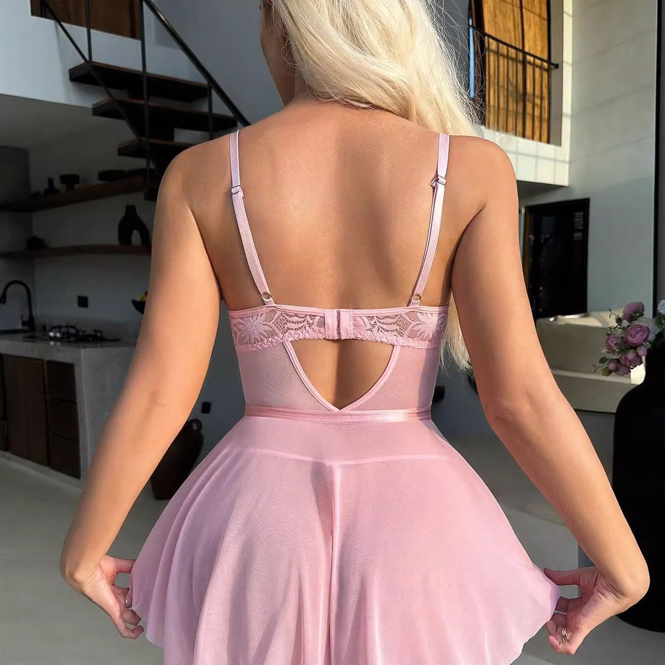 Pink flared dress with lace back detail, perfect for stylish lingerie fashion ملابس
