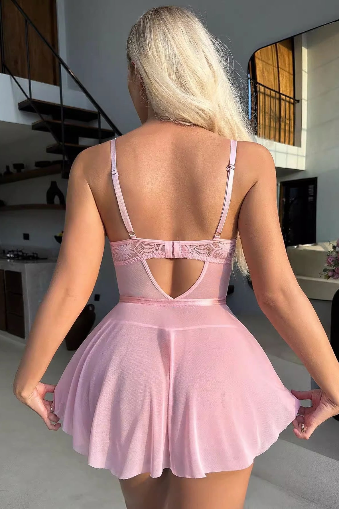 Pink flared dress with lace back detail, perfect for stylish lingerie fashion ملابس