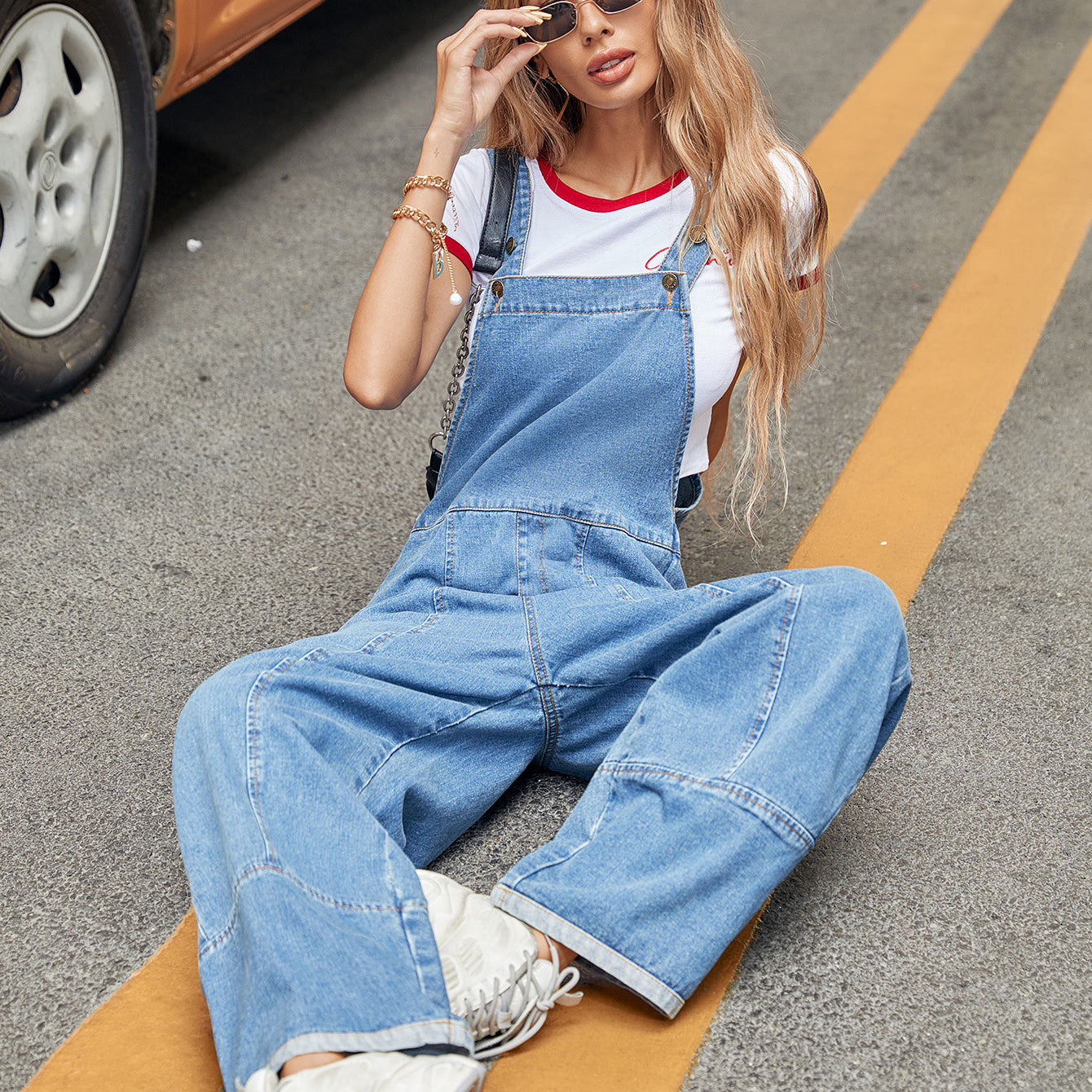 Casual Denim Jumpsuit paired with sneakers for trendy langry fashion ملابس