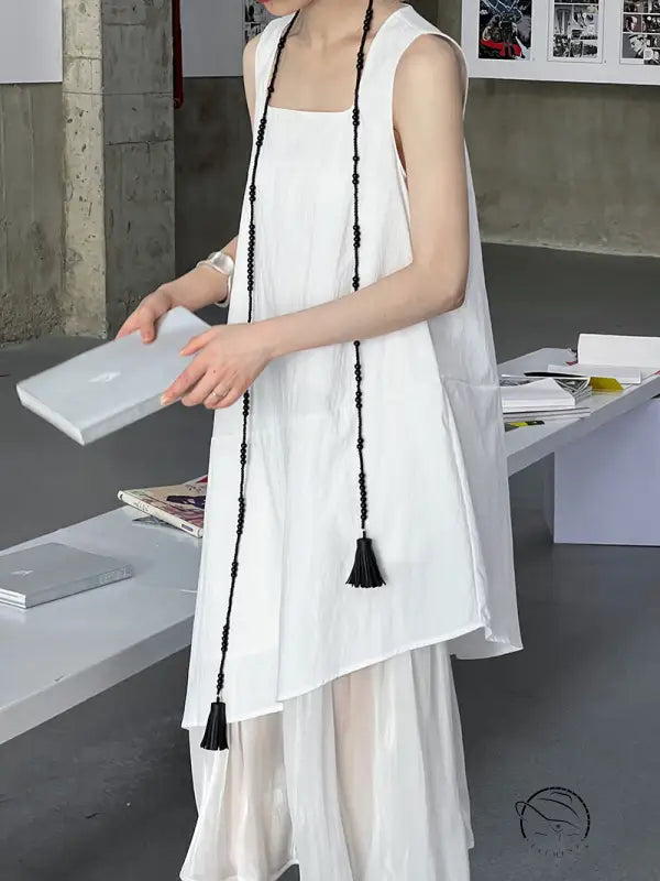 Elegant Korean style dress: white sleeveless layered with black tasseled rope