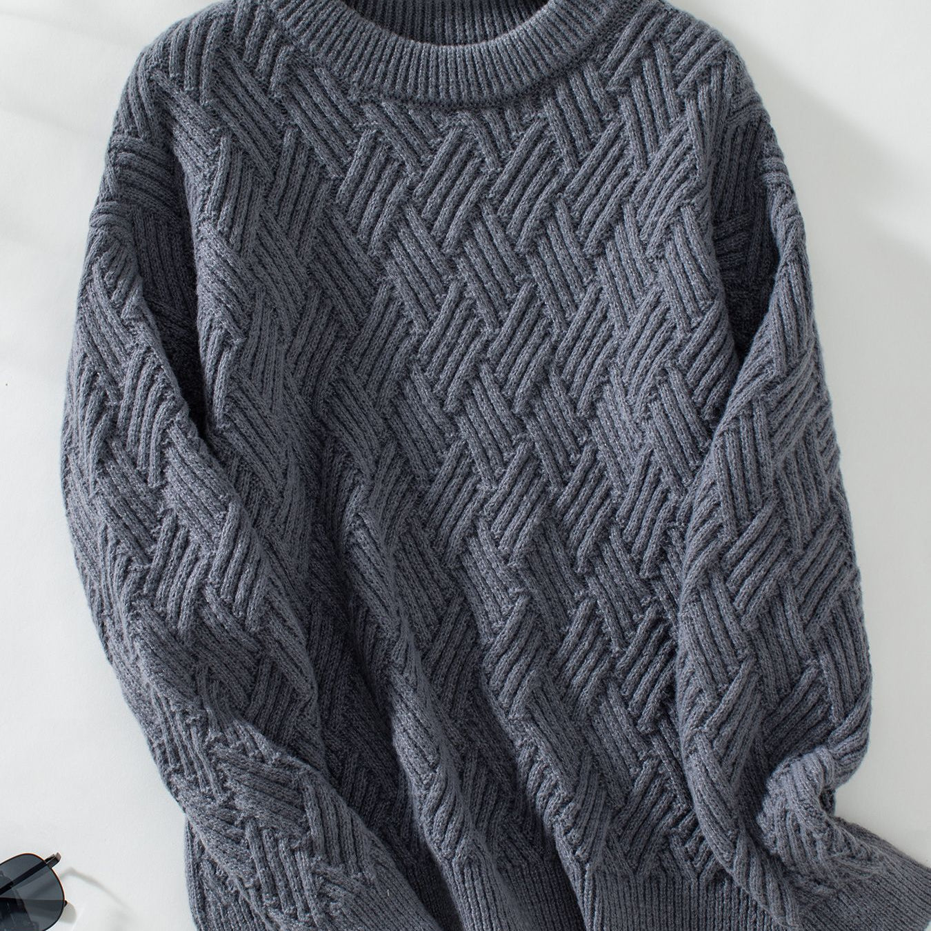 Charcoal gray cable knit crew neck sweater with herringbone pattern