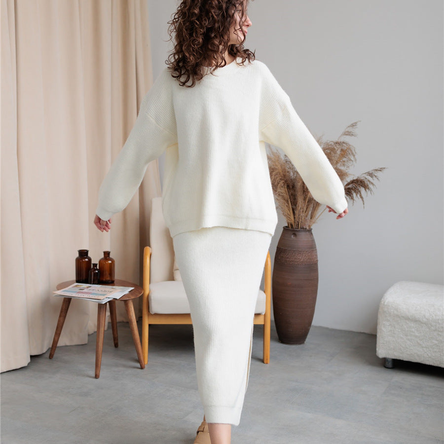 Woman in a white knit sweater and skirt from the Elegant Design Cardigan Knitted Skirt Sets
