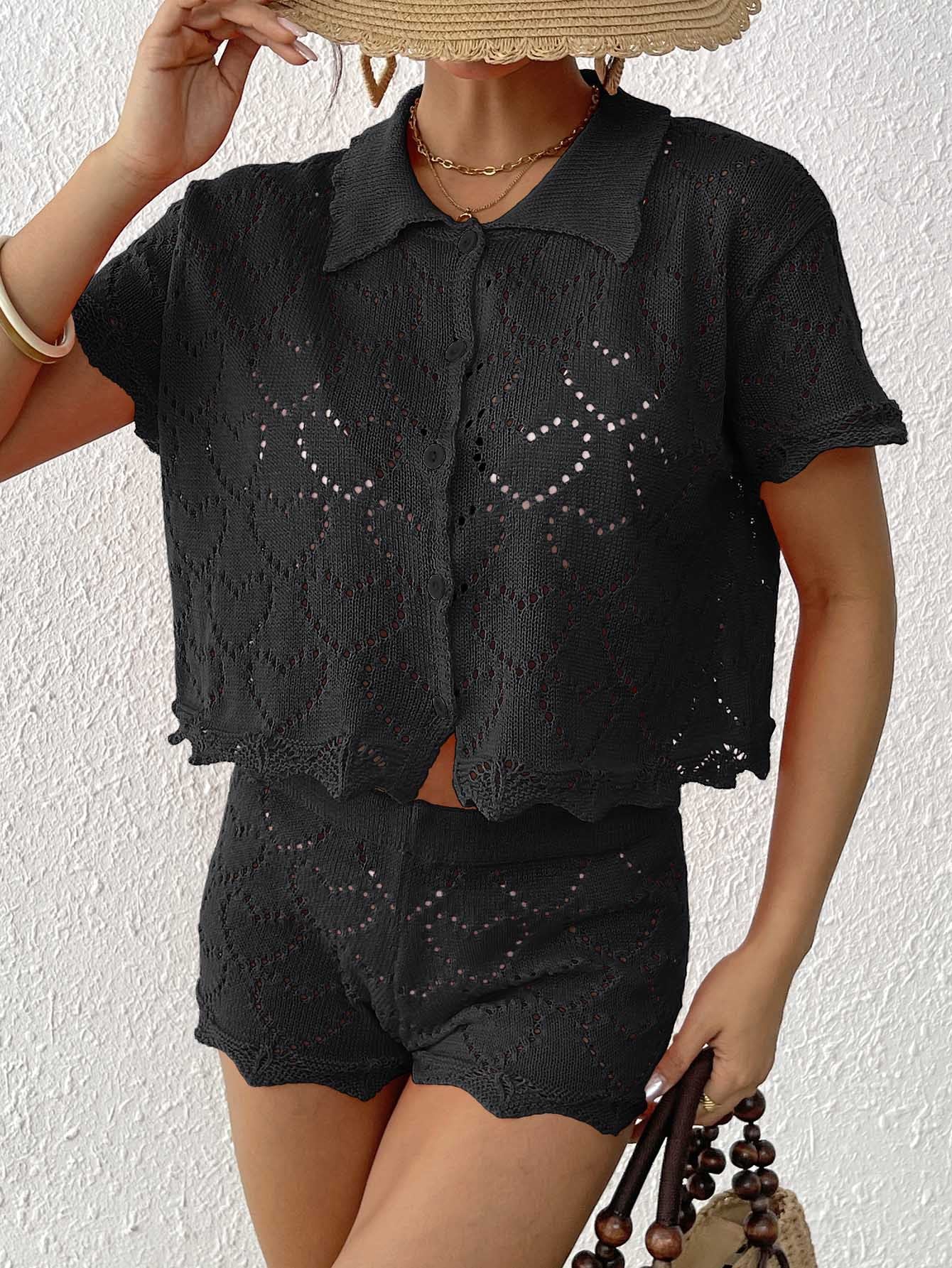 Black crochet knit two-piece set featuring stylish langry design and elegant sleeve length