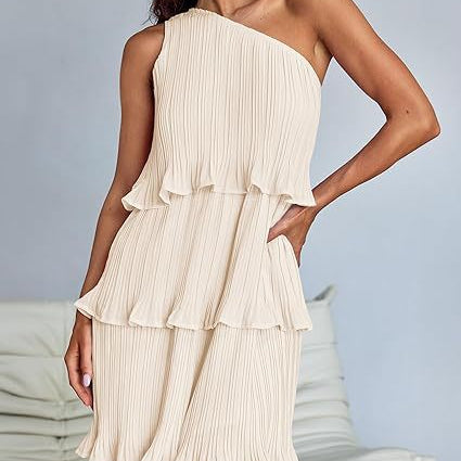 Beige one-shoulder layered stitching hem pleated sleeveless dress showcasing stunning shoulder details