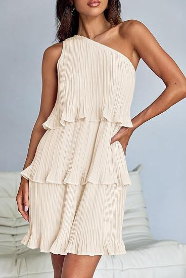 Beige one-shoulder layered stitching hem pleated sleeveless dress showcasing stunning shoulder details