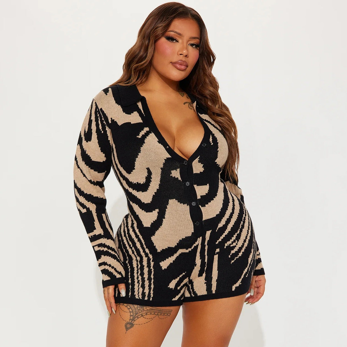 Black and beige long sleeve knit romper, perfect for casual fashion outfits