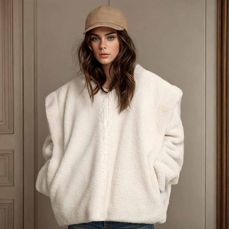Woman in a fuzzy white zip-up jacket from Langry’s stylish Berber fleece coat collection