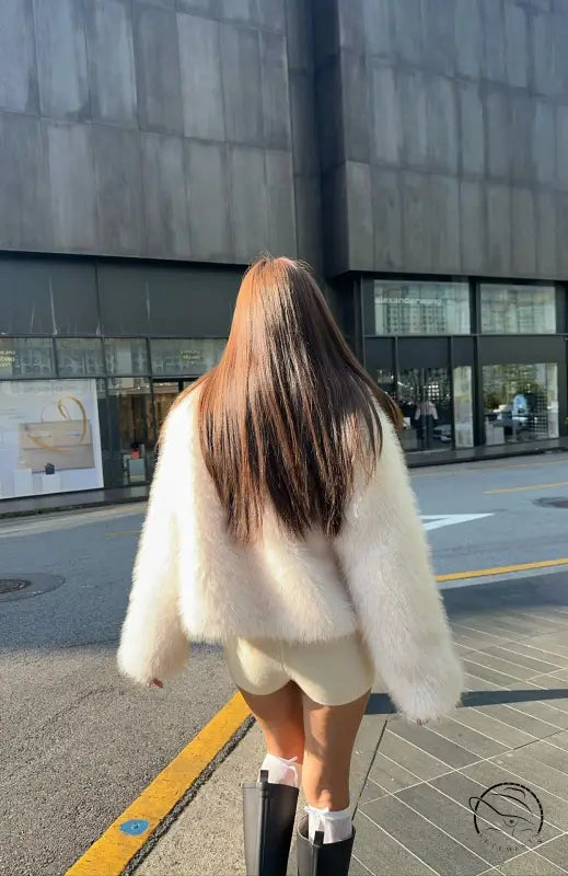 Langry short loose casual faux fur coat with cream oversized design, white trim, black buttons