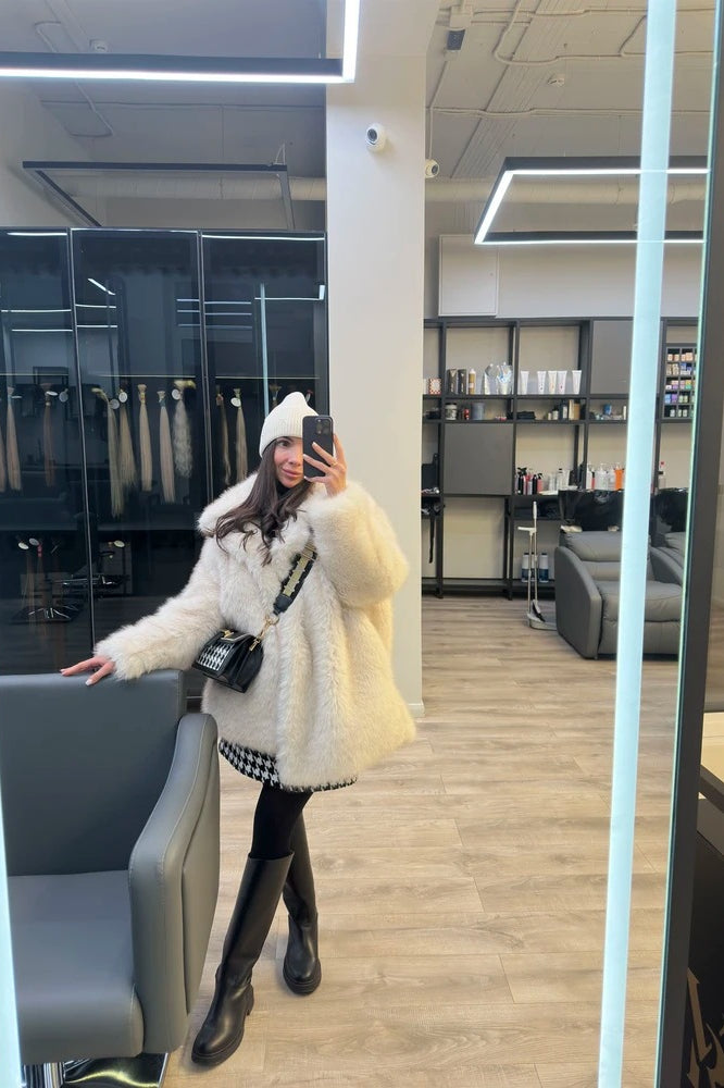 Langry faux fur mid-length jacket with cream fur, black trim, white pom-pom hat