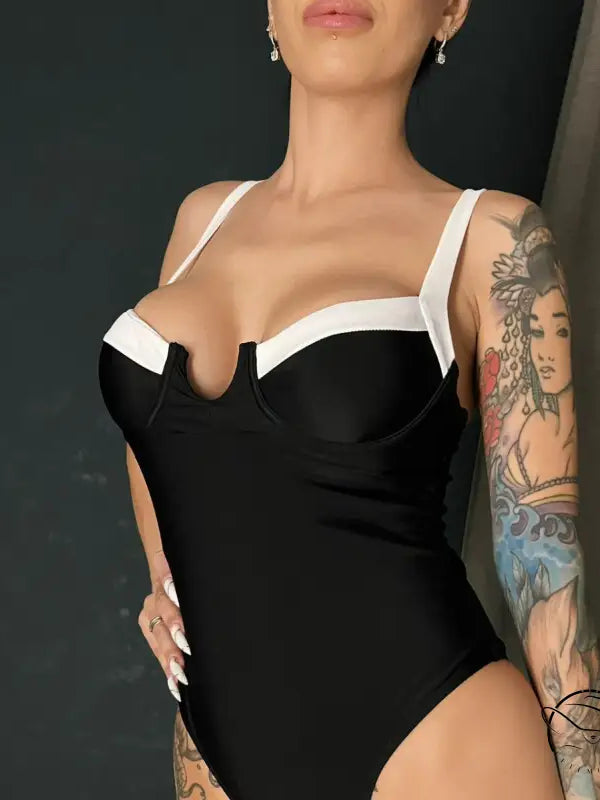 Elegant black and white langry one piece swimsuit in fashion ملابس