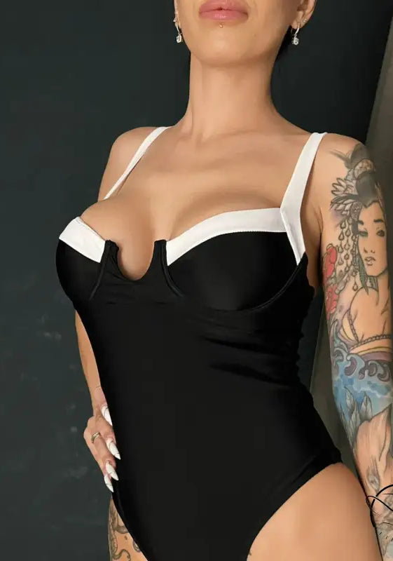 Elegant black and white langry one piece swimsuit in fashion ملابس
