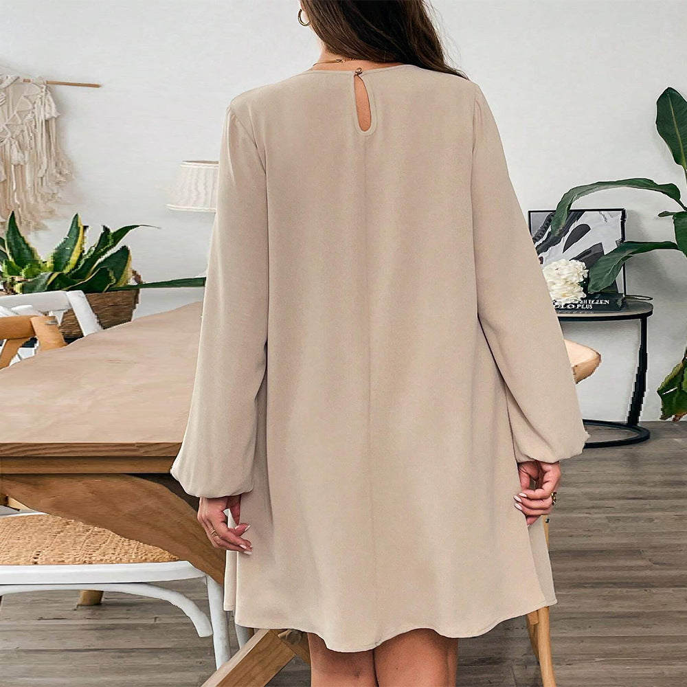 Elegant beige midi dress with keyhole back, perfect for winter fashion and comfort