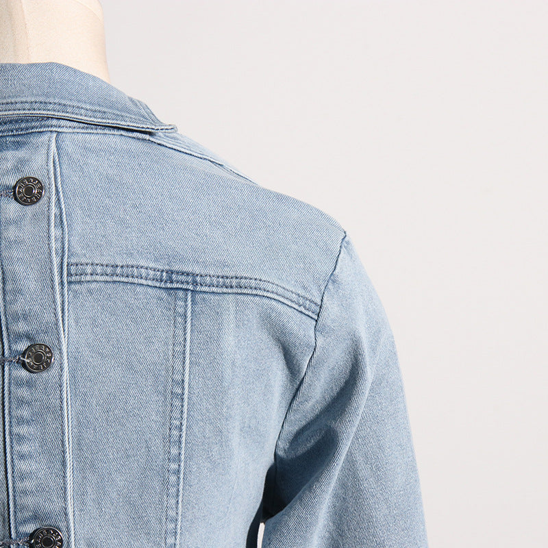 Light blue denim jacket with off-the-shoulder design, perfect for trendy fashion