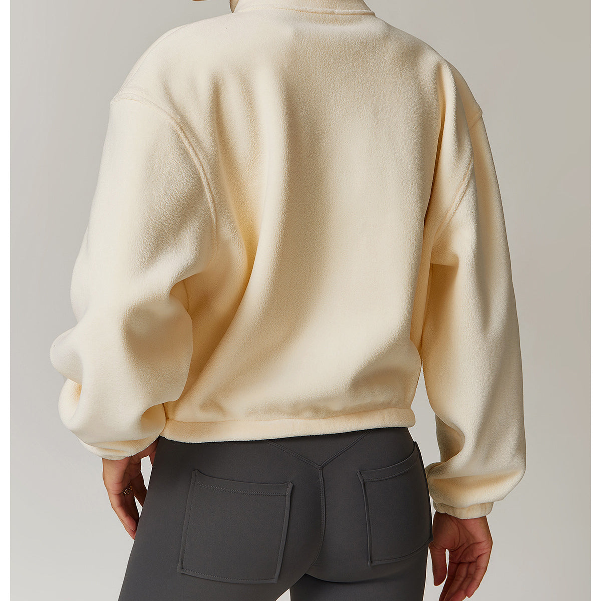 Cream-colored cropped sweatshirt with balloon sleeves, ideal for langry fashion ملابس
