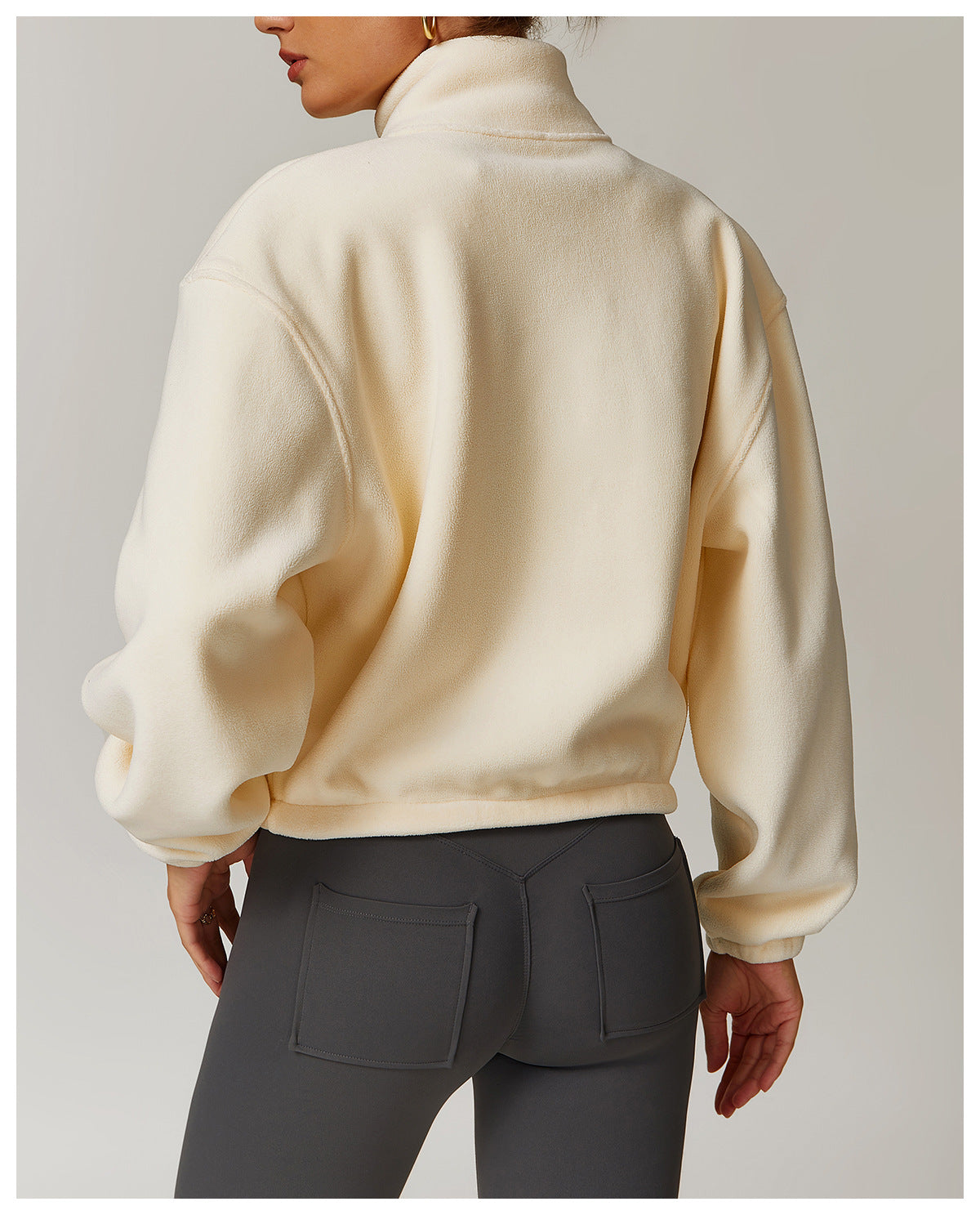 Cream-colored cropped sweatshirt with balloon sleeves, ideal for langry fashion ملابس