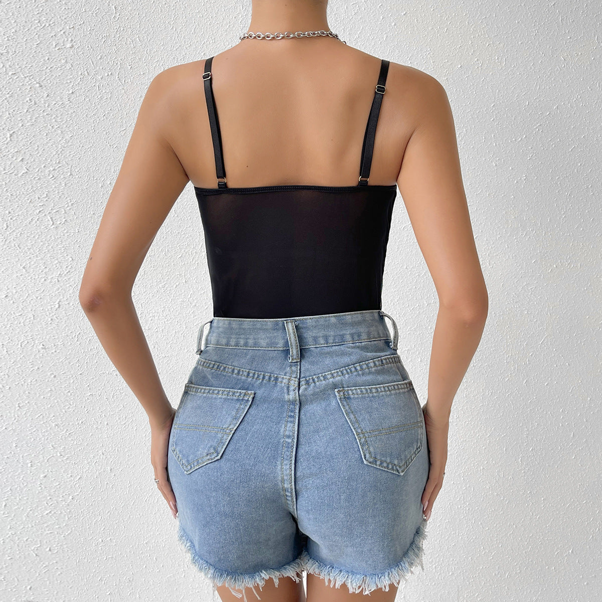 Black bodysuit with denim shorts from Stitching Contrast Color Women Summer Jumpsuit showcasing fashionable ملابس