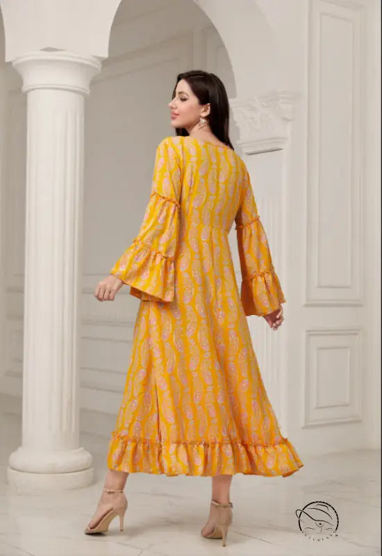 Elegant casual bell sleeve dress in flowing yellow paisley fashion