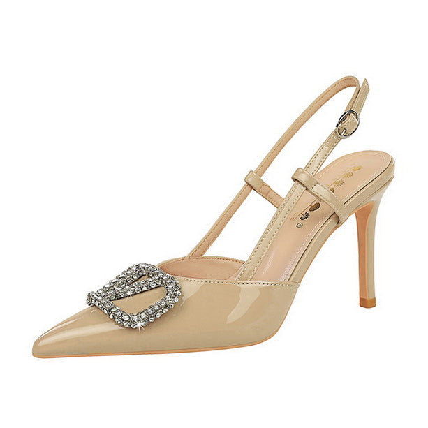 Elegant Langry gold patent leather slingback heels with rhinestone buckle