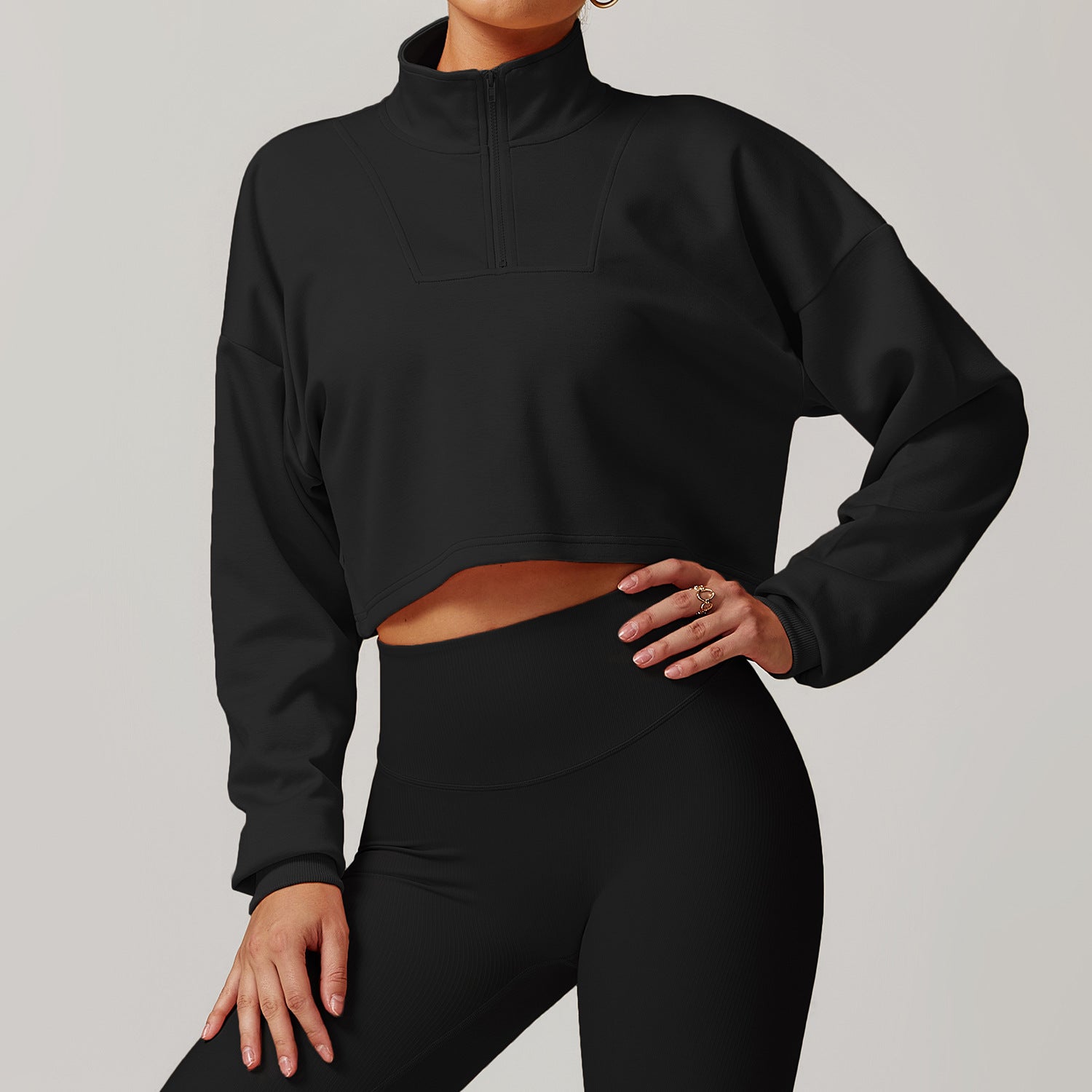 Black cropped turtleneck sweatshirt, a stylish choice for Winter Wild Outerwear fashion