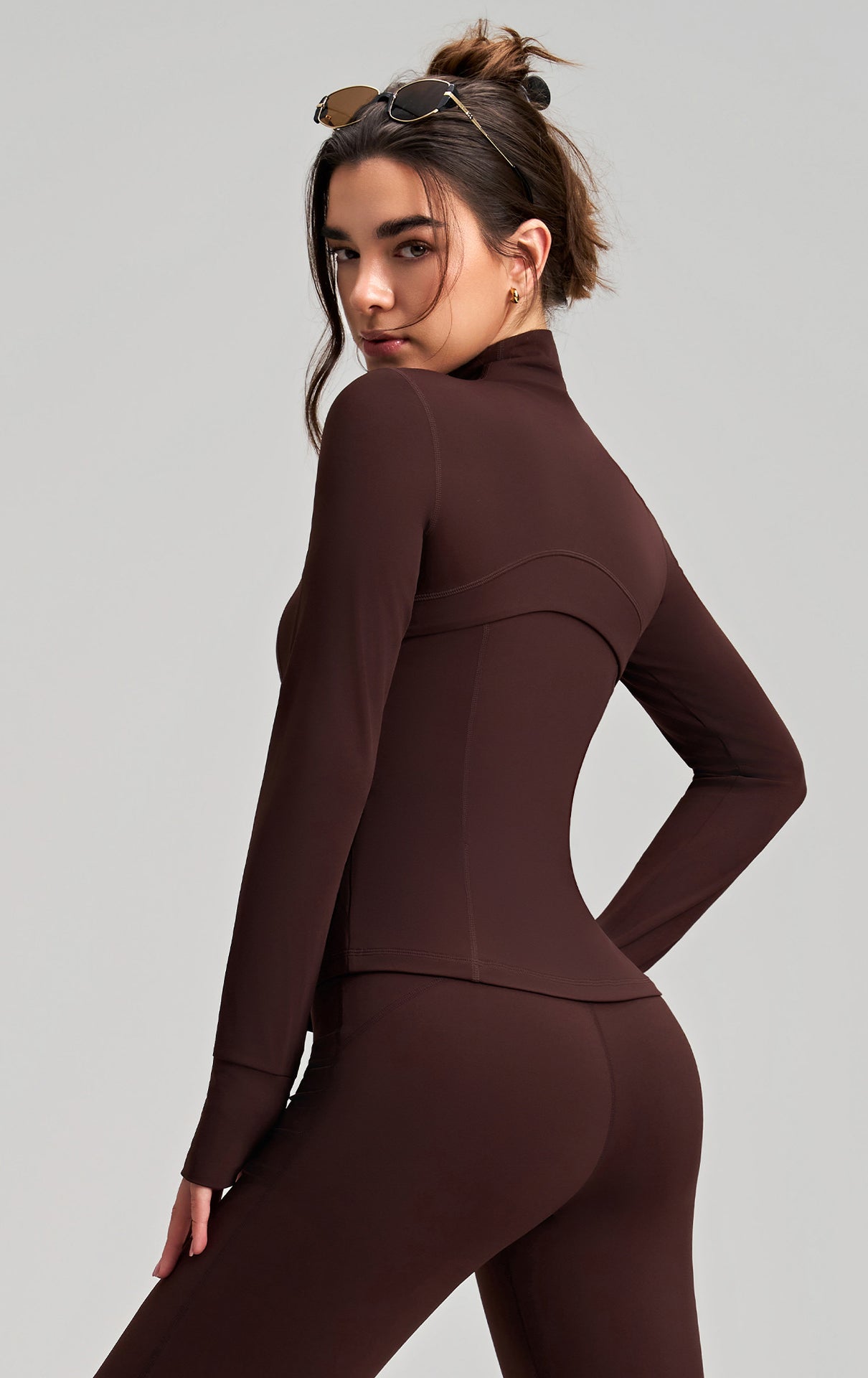Brown long sleeve spandex yoga jacket with finger stall and stand collar