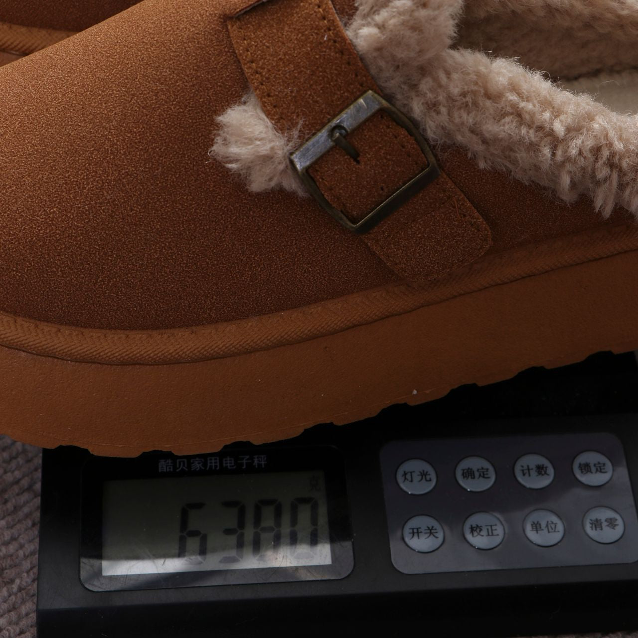 Brown faux-suede slipper with buckle for comfort and style in Langry fashion ملابس