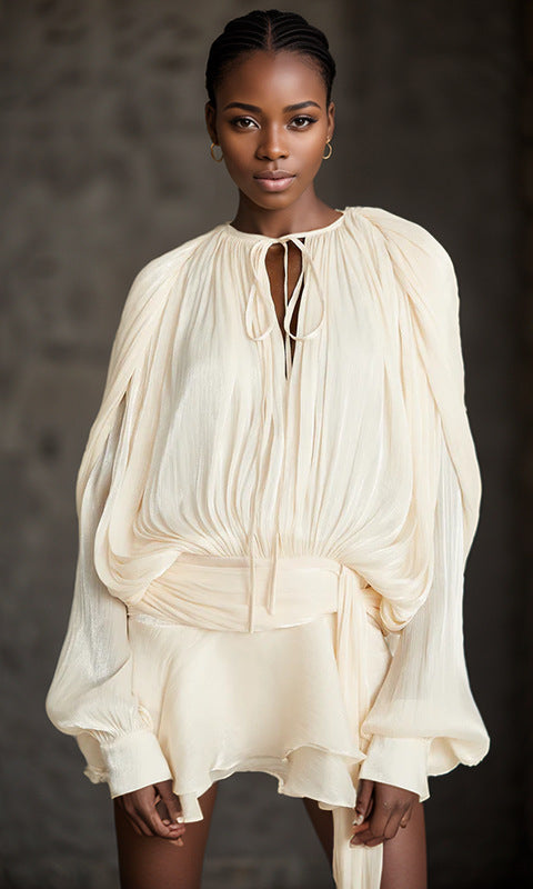 Elegant cream-colored dress from Gorgeous Design, perfect for fashionable occasions in ملابس