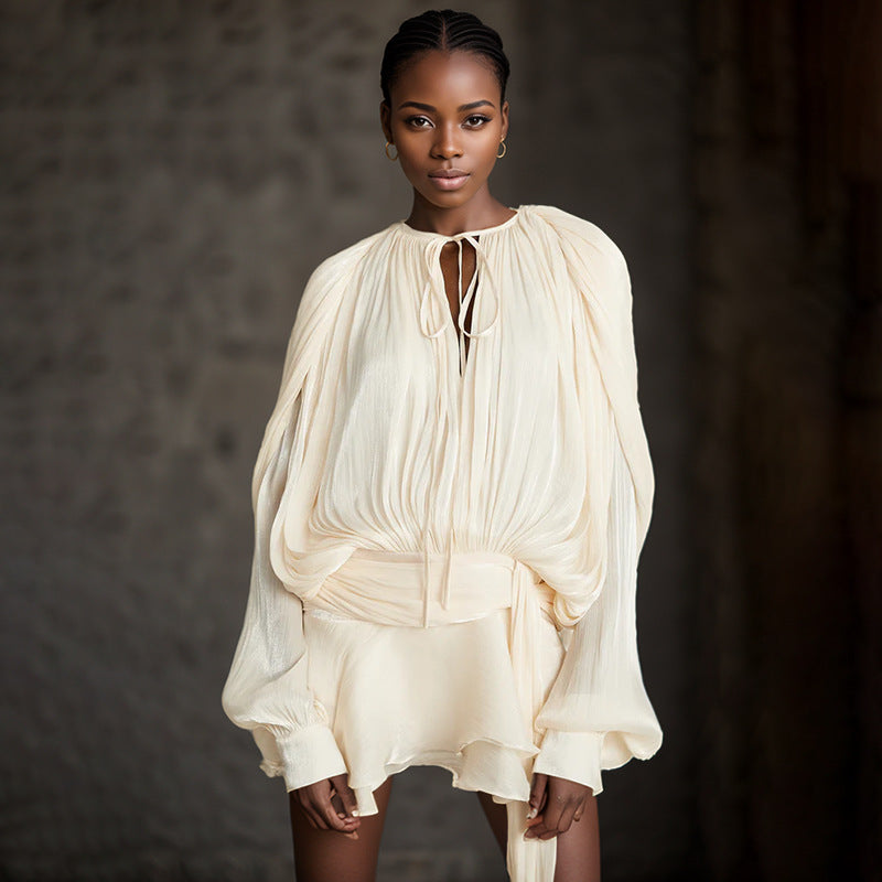 Elegant cream-colored dress from Gorgeous Design, perfect for fashionable occasions in ملابس