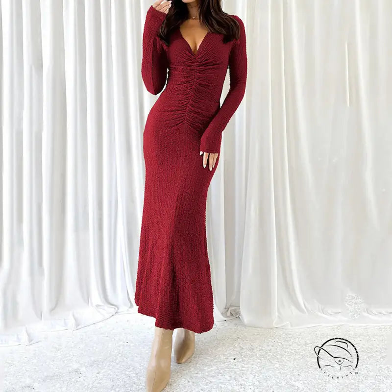 Beautiful knitted burgundy long-sleeved ruched dress