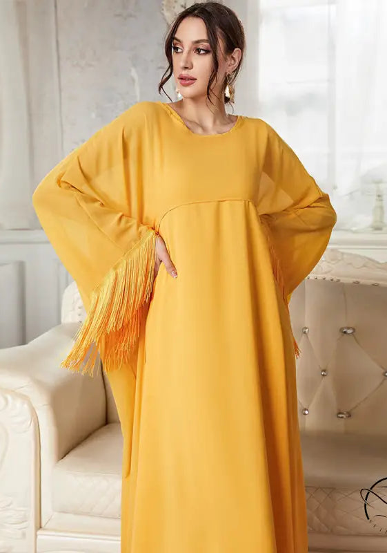 Mustard yellow abaya langry with fringed sleeves in flowing fashion silhouette