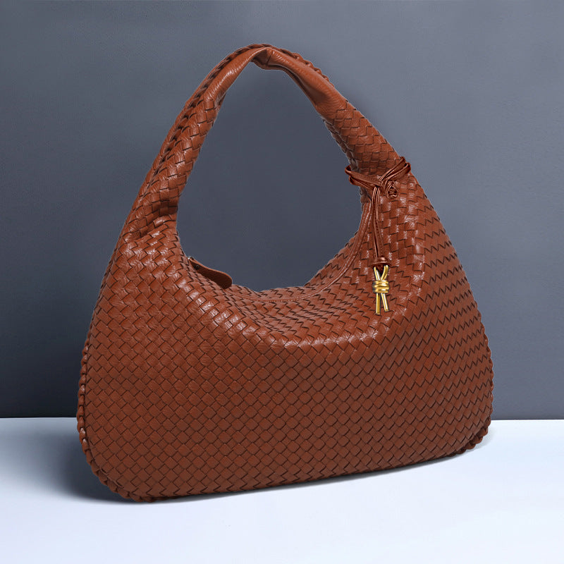 Brown woven leather hobo bag showcased as a stylish Casual Shoulder Bag in fashion