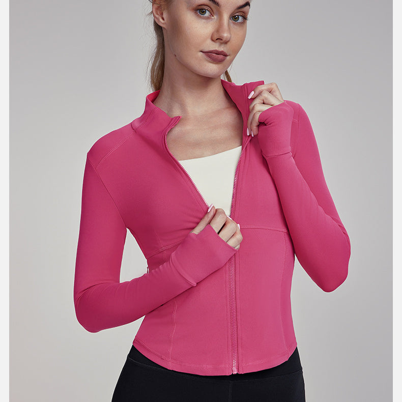 Woman in pink athletic jacket from Slim Fit Breathable Yoga Jacket collection, stylish ملابس