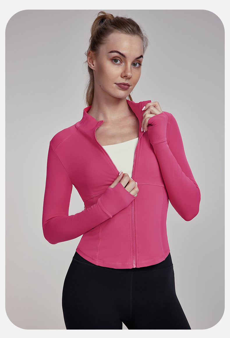 Woman in pink athletic jacket from Slim Fit Breathable Yoga Jacket collection, stylish ملابس