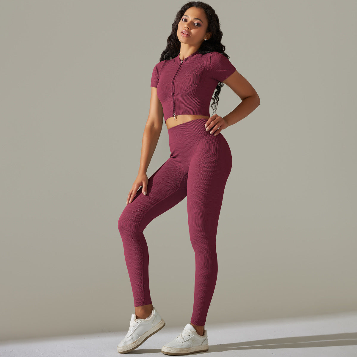 Seamless knitted peach workout set featuring Burgundy ribbed fabric and peach hip high waist design