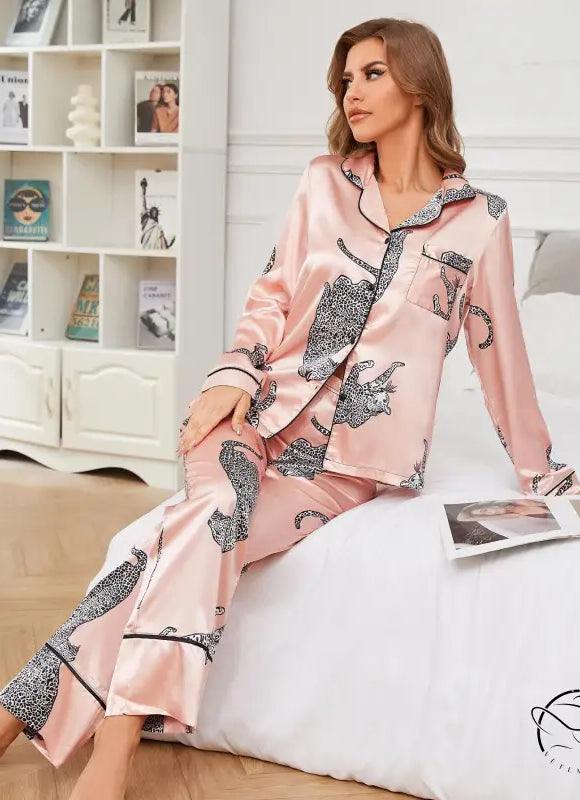 Pink satin winter animal long sleeved pajama set with black leopard print