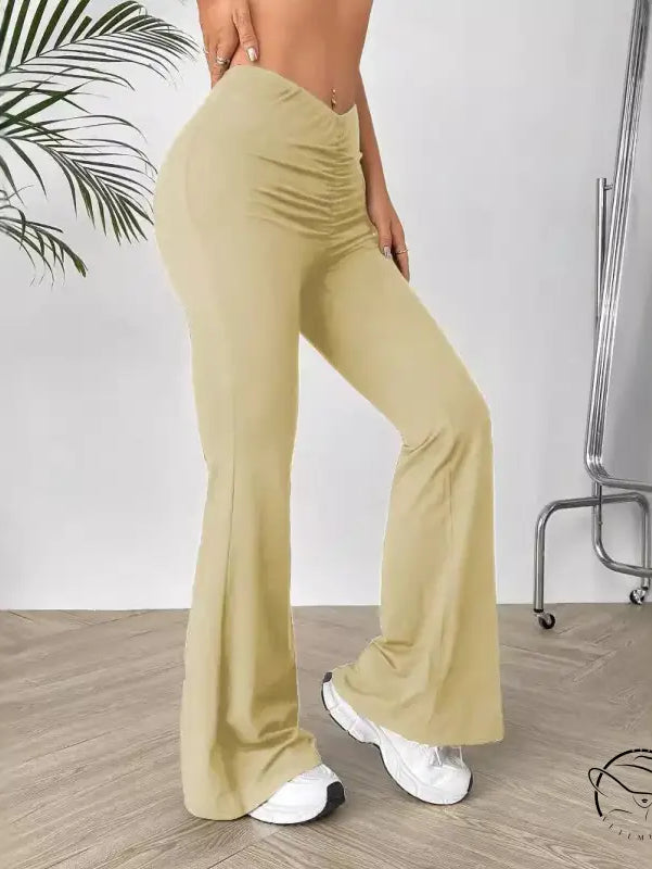 Khaki shaped waist slimming bootcut trousers with V-cut waist