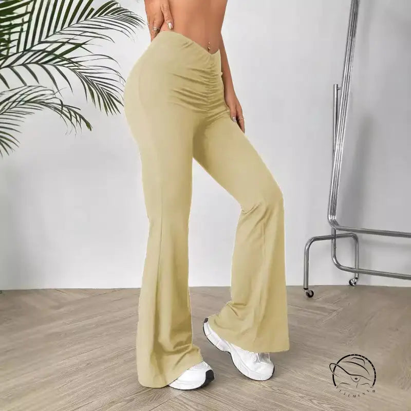 Khaki shaped waist slimming bootcut trousers with V-cut waist